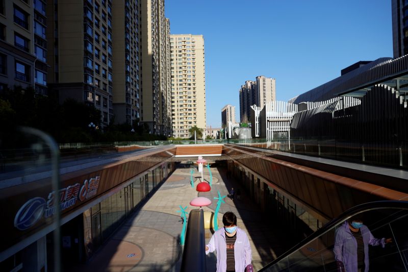 China Evergrande shares slide 6% in early trade