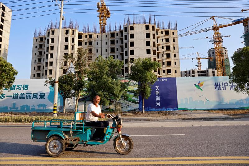 China's mom-and-pop investors, builders and homebuyers caught in Evergrande debt crisis