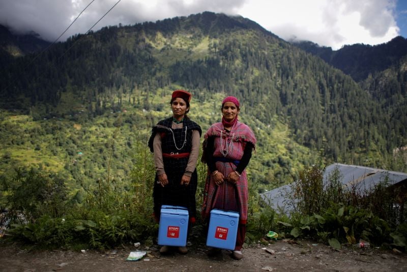 Doctors scale rockslides, invoke gods to vaccinate Himalayan villages