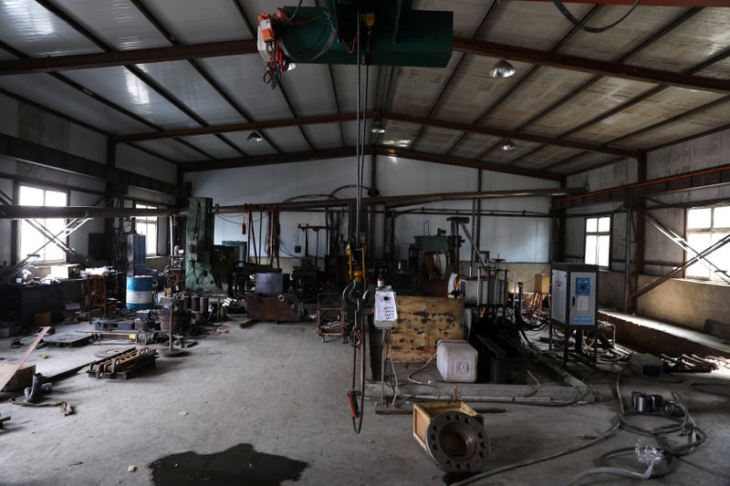 Asian factories stagnate as China's slowdown, supply constraints hit