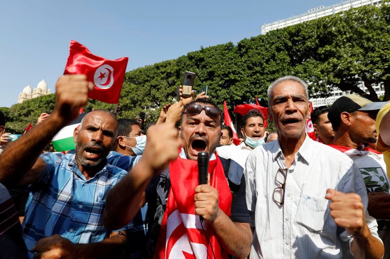 Backers of Tunisian president rally against 'coup' accusations