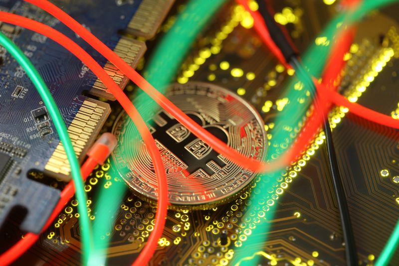 Bitcoin hovers near 6-month high on ETF hopes, inflation worries