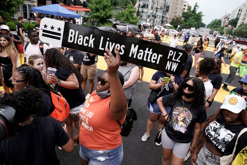 Black Americans, women make big strides on top U.S. corporate boards -report