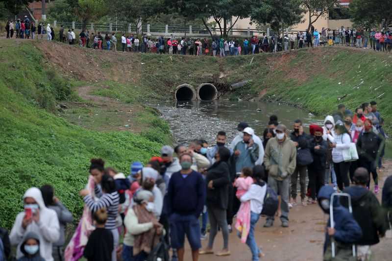 Brazil eyes combining pandemic relief, 'Bolsa Familia' welfare in 2022, says source