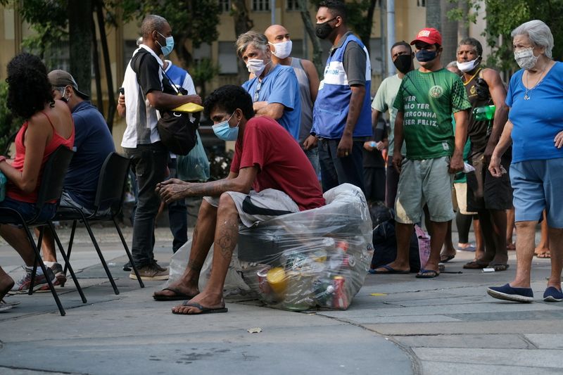 COVID cases dropping in North and South America, regional health agency says