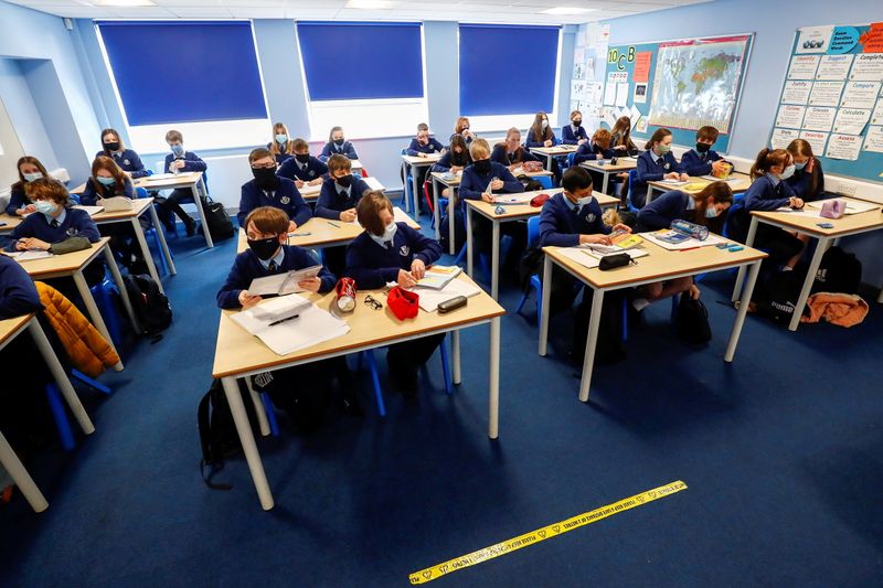 Children fuel English COVID case rise after slow vaccine start