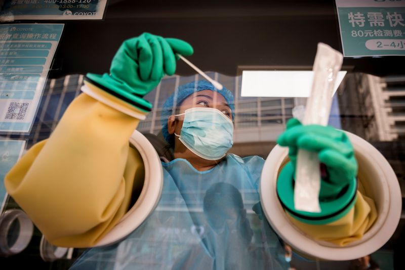 China's COVID-19 outbreak grows as cities race to trace infections