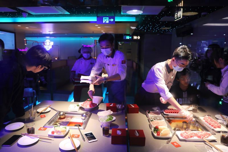 Chinese hot pot chain Haidilao slows growth as COVID-19 curbs consumer appetite