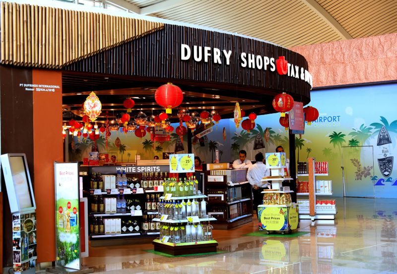Duty free retailer Dufry ups 2021 targets on travel pickup