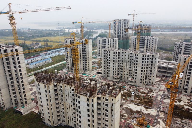 Evergrande averting default to do little to revive China property bond sales