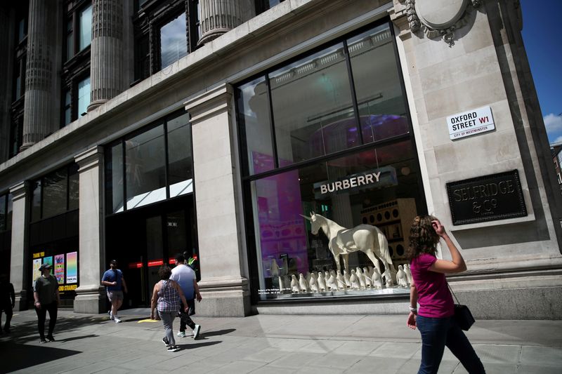 Factbox-Burberry's new CEO Akeroyd returns to British roots