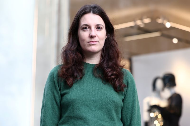 Green activist hid in Louvre loos before gatecrashing Louis Vuitton's show