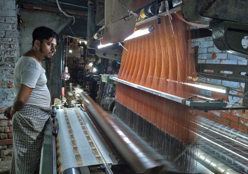 In India's city of silk sarees, rising prices pose risk to nascent recovery