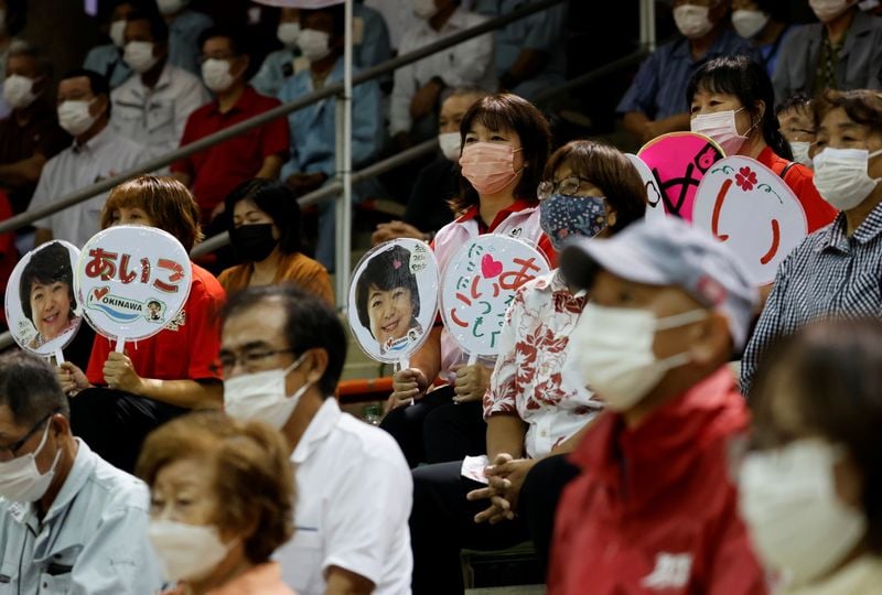 In Japan's Okinawa, ruling party's tough China stance helps win young voters