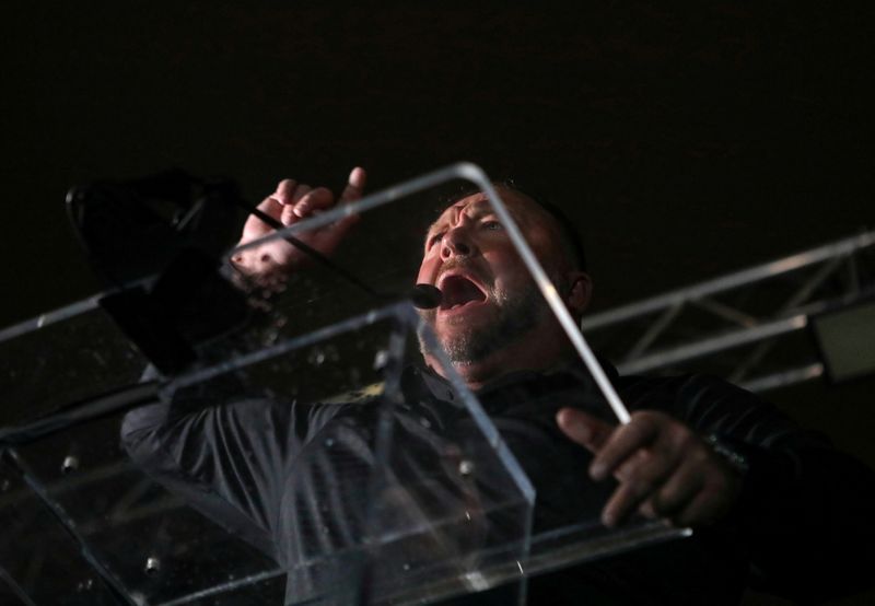 Infowars founder Jones who claimed Sandy Hook shooting was hoax loses defamation cases
