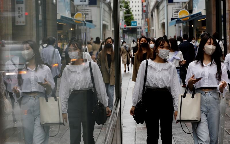 Japan's Q3 growth forecast trimmed further on COVID-19 drag: Reuters poll
