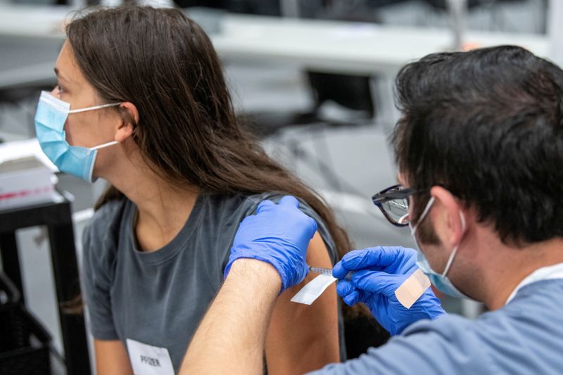U.S. administers nearly 394 million doses of COVID-19 vaccines - CDC