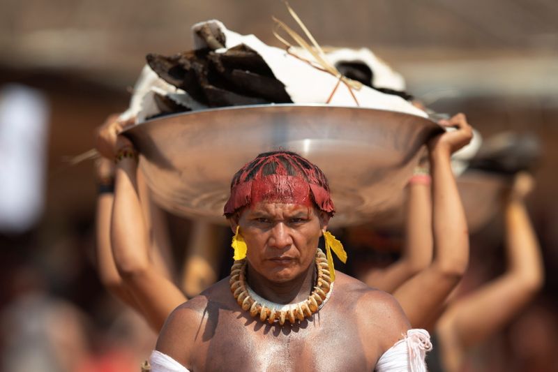 WIDER IMAGE-Besieged Amazon tribes grant rare access to Xingu chief’s funeral rites
