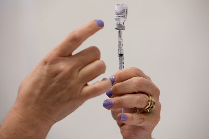 90% of U.S. federal employees have received at least one COVID-19 dose - officials