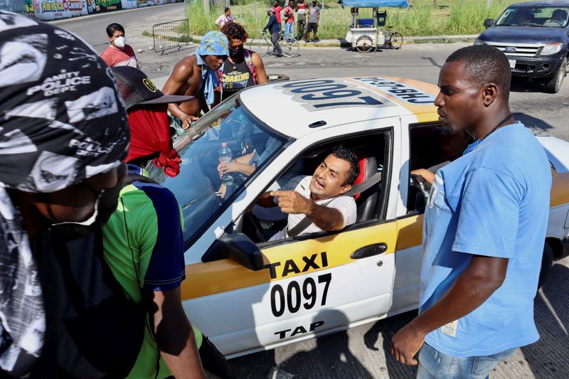Caravan migrants accept Mexico visa deal to disperse