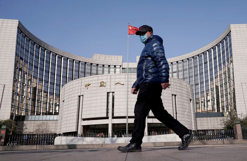 China Oct new bank loans fall less than expected, stagflation risk limits easing room
