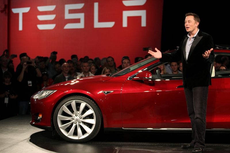 Factbox-Tesla's Musk halfway through his pledge with $9 billion stake sale