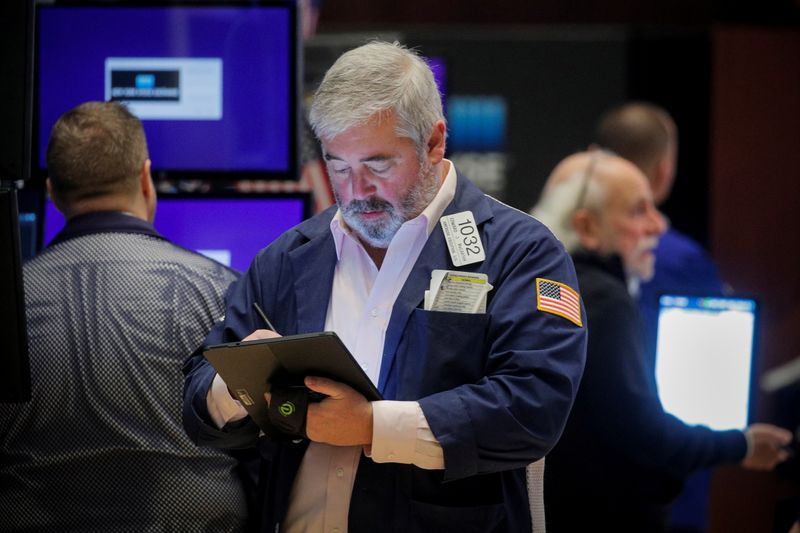 Futures edge higher on boost from J&J, tech stocks