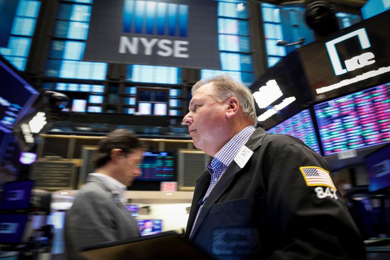 Futures tick higher after Congress clears infrastructure bill; Tesla falls