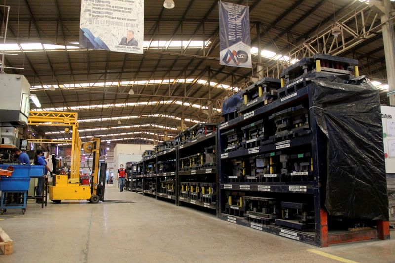 In Mexico's auto heartland, workers struggle as chip shortage bites