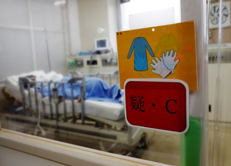 Japan prepares beds, booster shots in COVID-19 lull before winter
