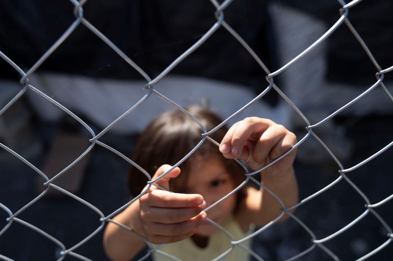 Migrant kids, some U.S.-born, endure hardship in Mexico border camp
