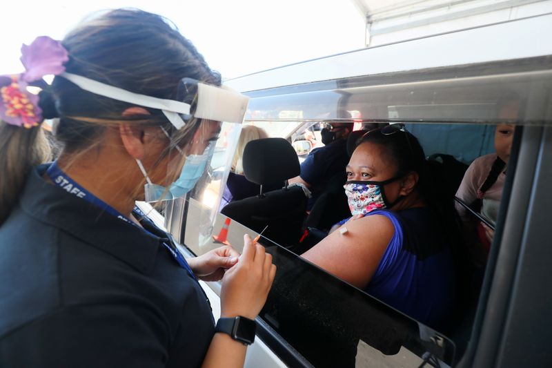 New Zealand keeps pandemic curbs for another week in Auckland