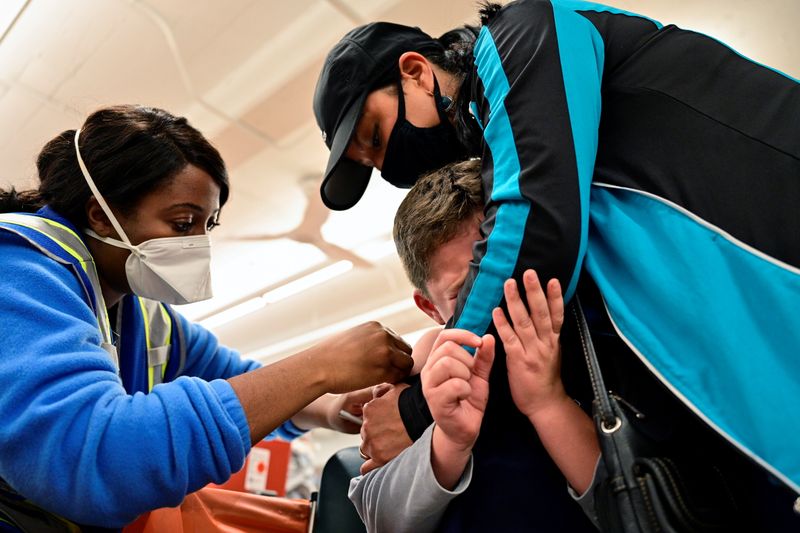 Over 900,000 kids expected to receive first Covid shot by day end - White House