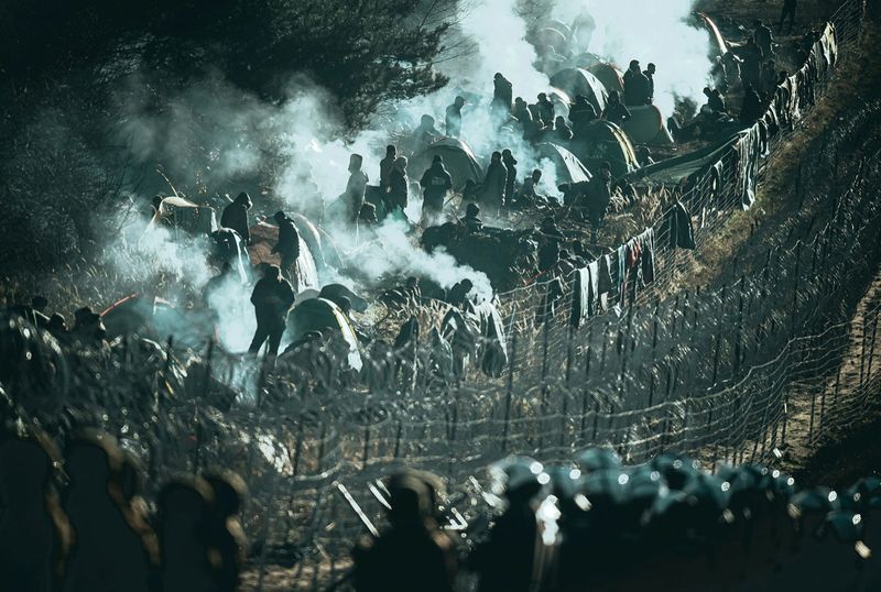 Stranded migrants try again to breach Polish border as more troops deployed