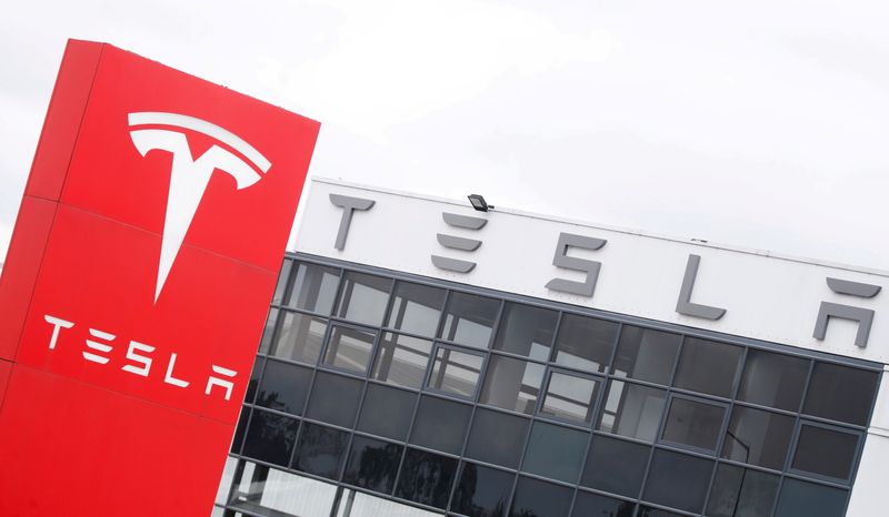 Tesla shares fall after Musk's Twitter poll backs stake sale