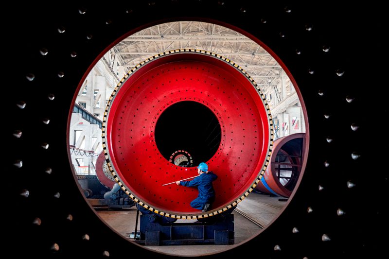 Asian factories shake off supply headaches but Omicron presents new risks