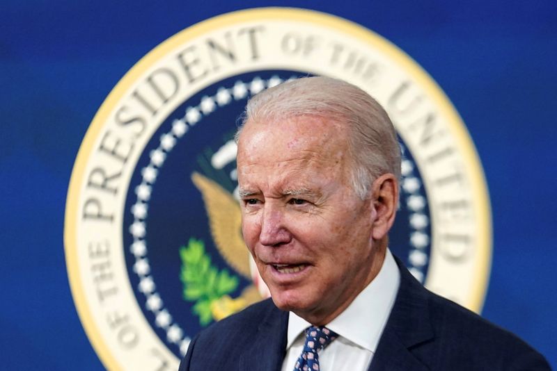 Biden to propose stepping up U.S. fight against AIDS with research, treatment