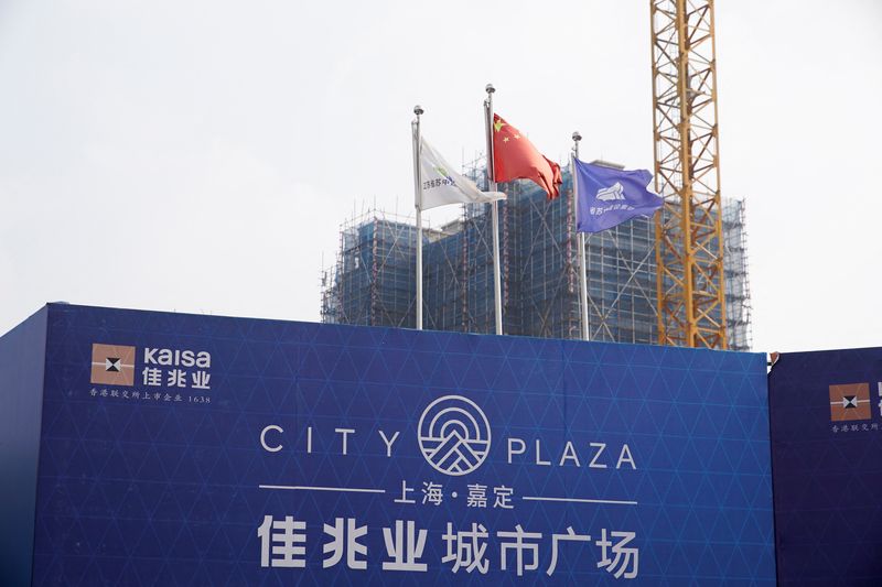 China urges real estate project acquisitions to aid struggling developers -state media