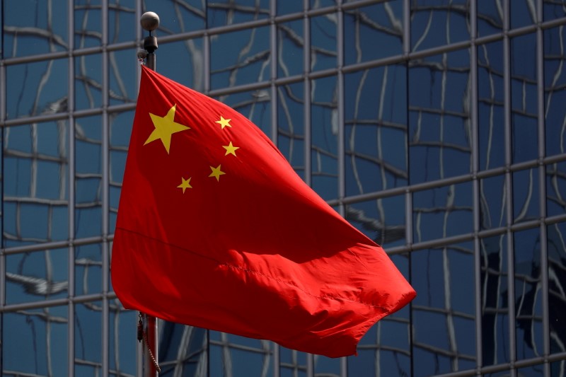 China will encourage listing of leading futures firms, to issue futures law