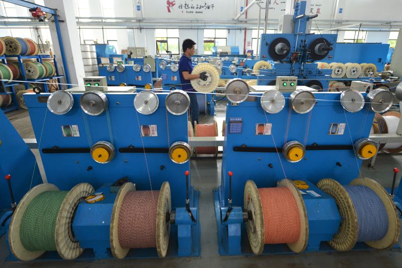 China's factory output speeds up but retailers struggle on new COVID hit