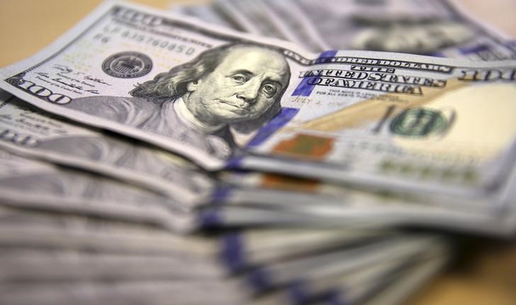 Dollar Up As the Fed Signals An Earlier Interest Rate Hike