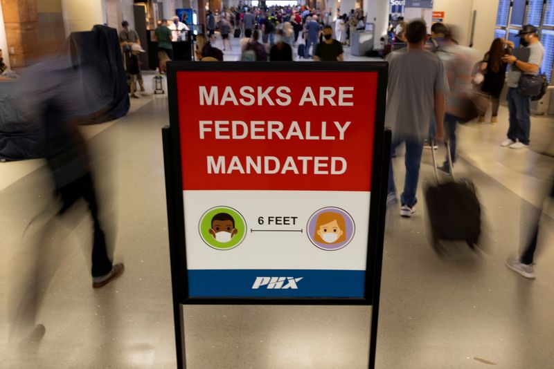 Exclusive-U.S. to extend transit mask mandate through mid-March -- sources