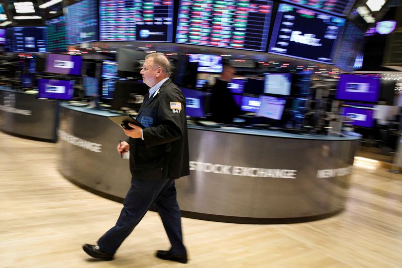 Futures tumble on fears of tighter curbs to combat Omicron's spread
