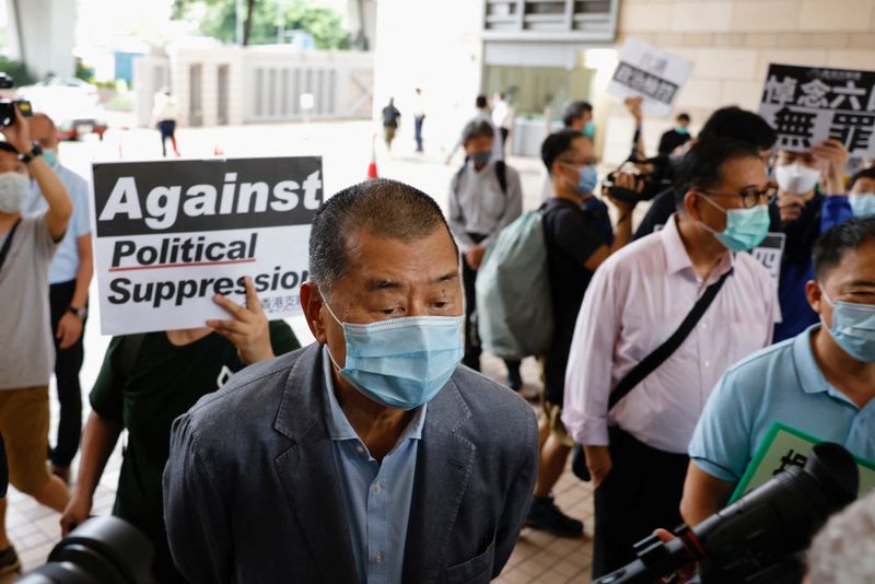 Hong Kong activists get up to 14 months in prison for banned Tiananmen vigil