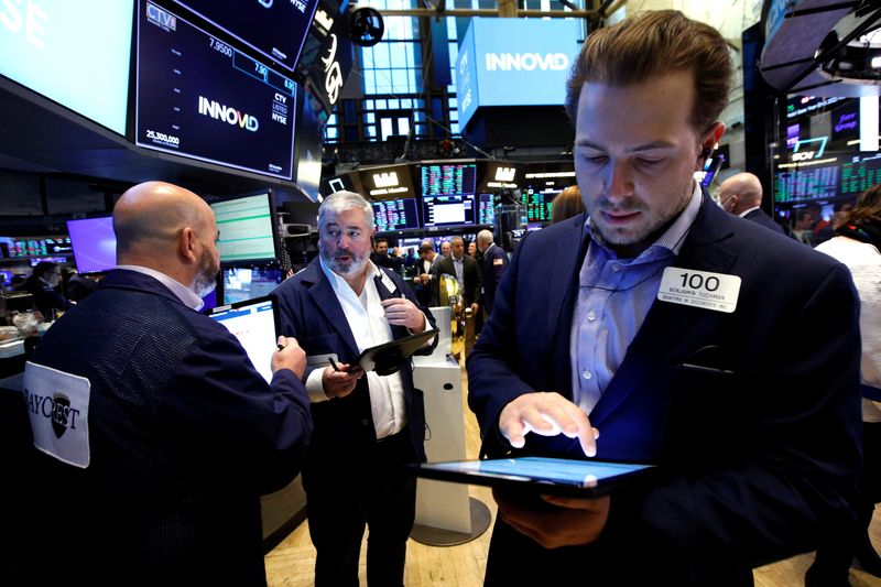 Investors track COVID case counts, watch key market levels as Omicron fears grow