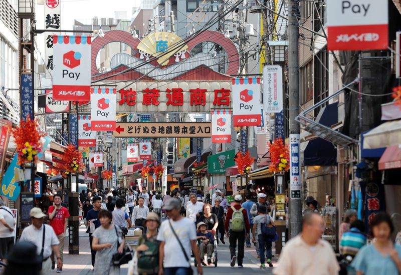 Japan to give massive tax breaks to companies that lift wages - draft plan