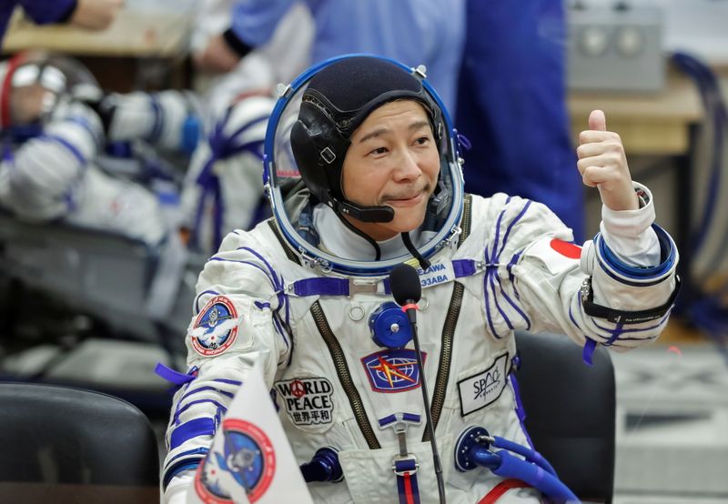 Japanese billionaire Maezawa blasts off to International Space Station
