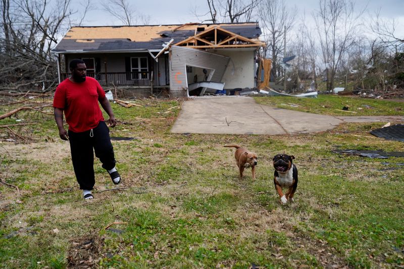 Kentucky survivors vow to rebuild 'junkyard' left by tornado
