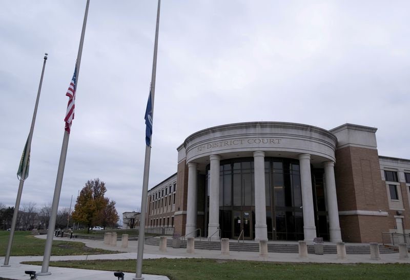 Parents of suspected Michigan school shooter, themselves wanted, taken into custody