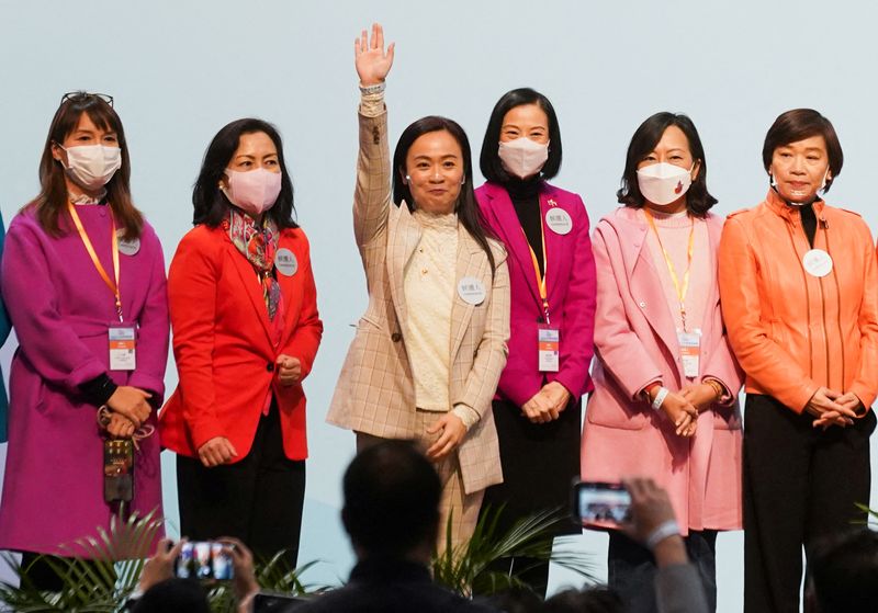 Pro-Beijing candidates sweep 'patriots'-only Hong Kong vote amid low turnout